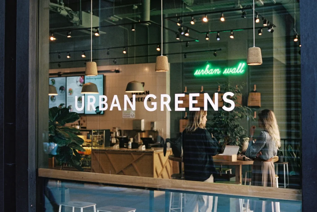 Urban Greens window with company branding