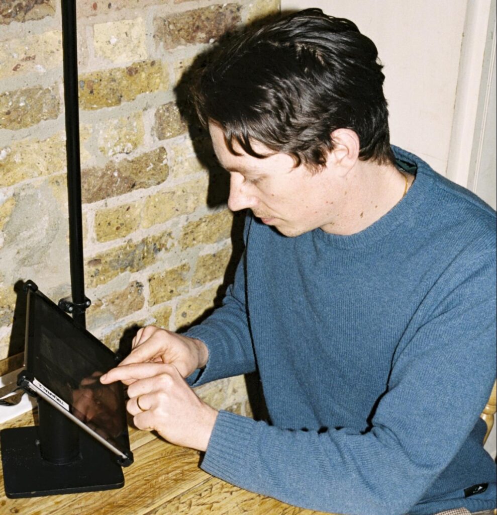 Franchisee using a tablet to complete online training