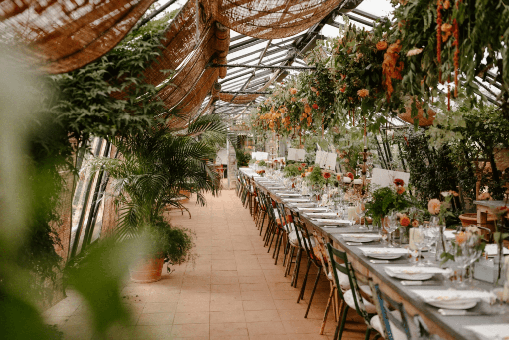 Table laid out in the greenhouse at Petersham Nurseries